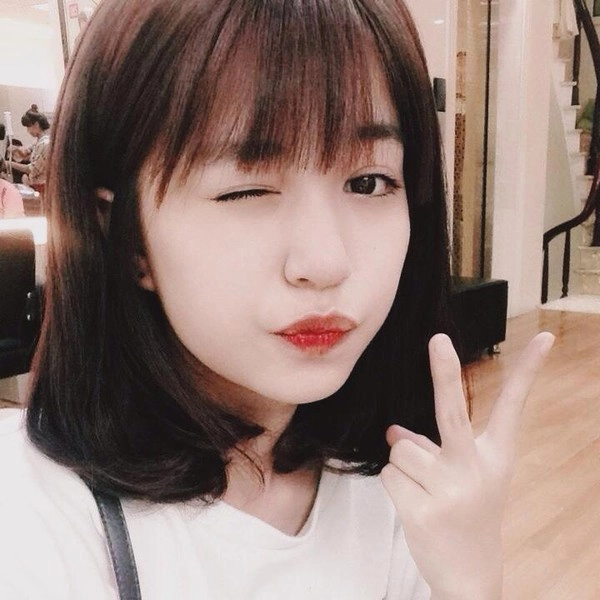 Tóc lob ngang vai mái thưa đẹp cho nàng mặt tròn