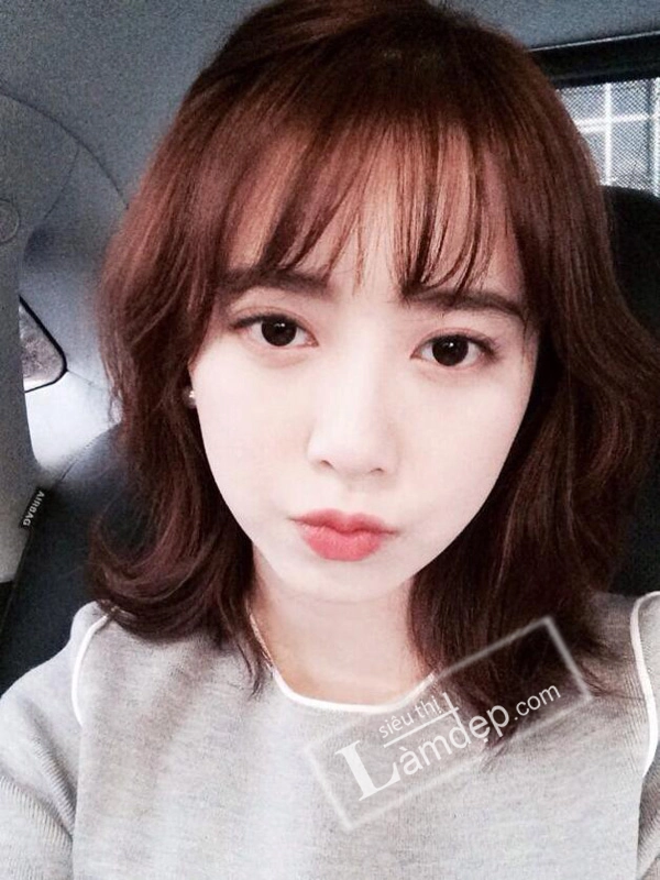 Tóc lob ngang vai mái thưa đẹp cho nàng mặt tròn