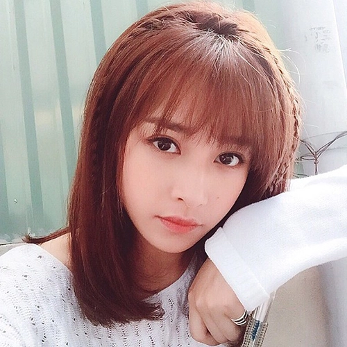 Tóc lob ngang vai mái thưa đẹp cho nàng mặt tròn